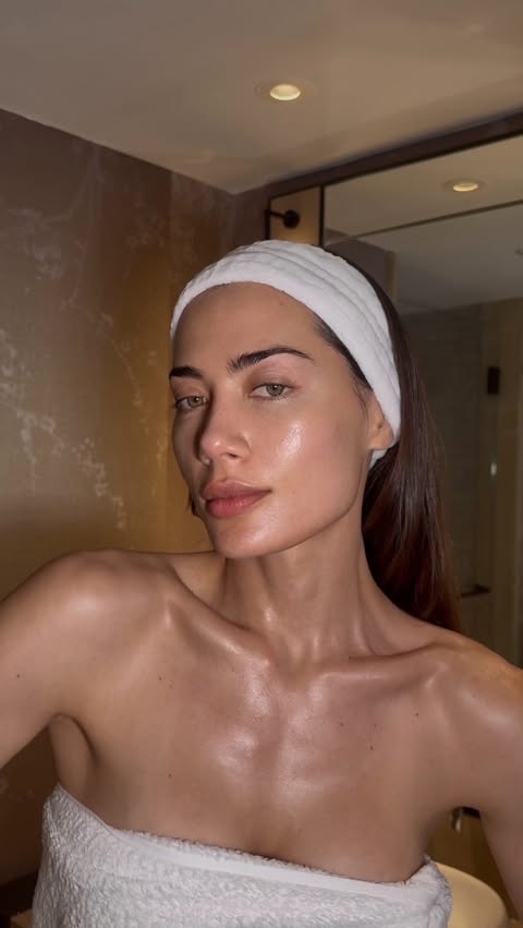 Instagram post by @georginamazzeo for Dr.Melaxin. Caption reads: Exfoliate. Treat. Glow 🤍 @dr.melaxin_global #ad ✨....