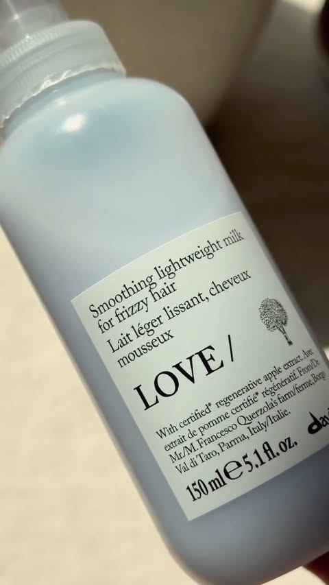 Instagram post by @meha.ugc for Davines. Caption reads: [...] frizz decides to show up uninvited🪽....