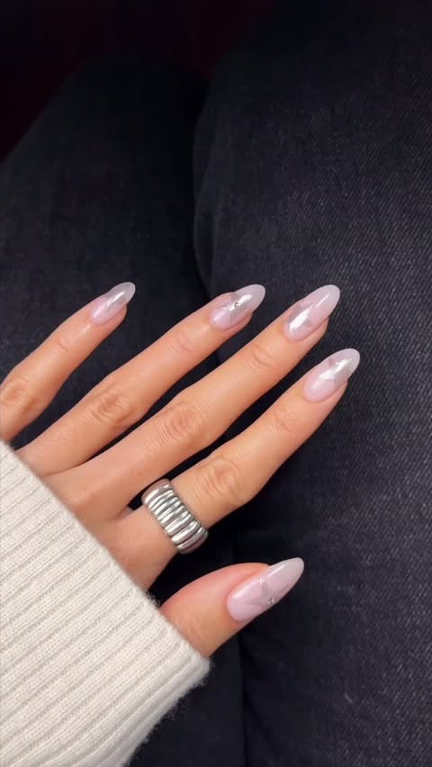 Instagram post by @nailsbyalsn for Mejuri. Caption reads: subtle silver chrome stars 🩶⛓️🌟 @mejuri....
