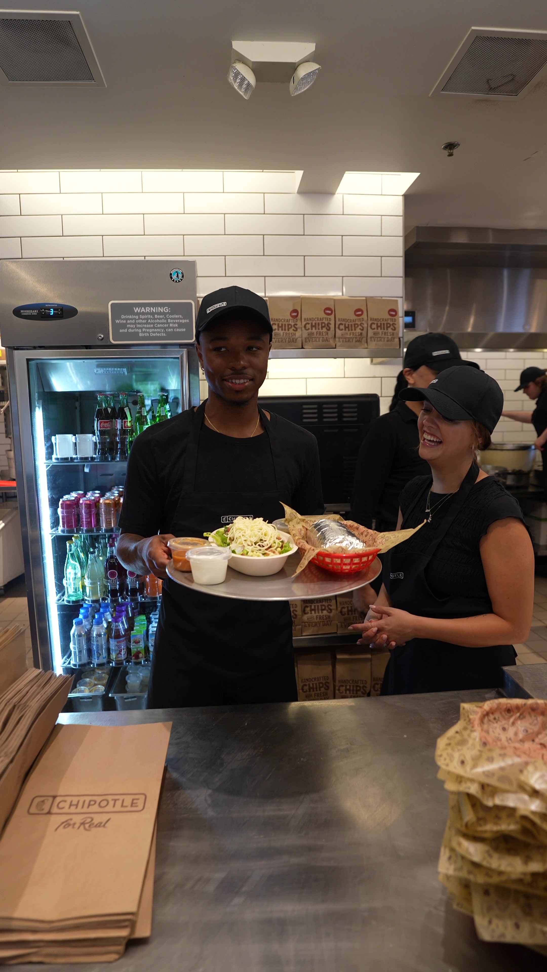 TikTok post by @joshandsav for Chipotle. Caption reads: the Josh & Sav burrito and bowl is available now....