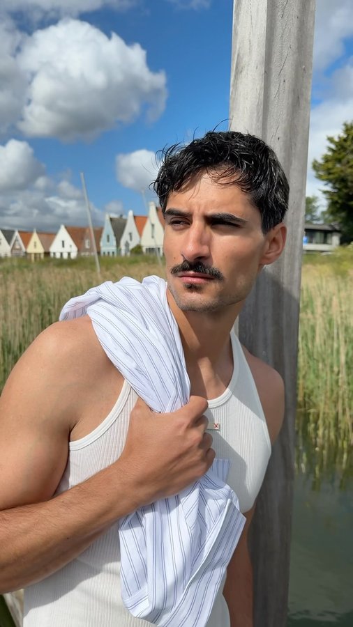 Instagram post by @itsdiogobaptista for FARFETCH. Caption reads: checked in by the pier @farfetch ad.