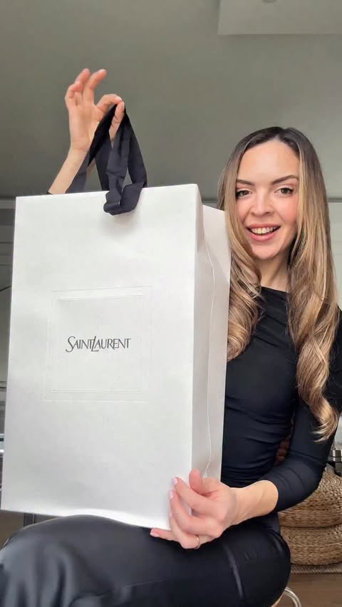 Instagram post by @simlacilingiroglu for Saint Laurent. Caption reads: 🩶 #reklam @ysl.