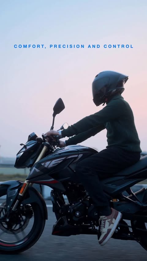 Instagram post by @ekbihari for Bajaj Auto. Caption reads: Gold is not just a colour. It is a feeling you get....
