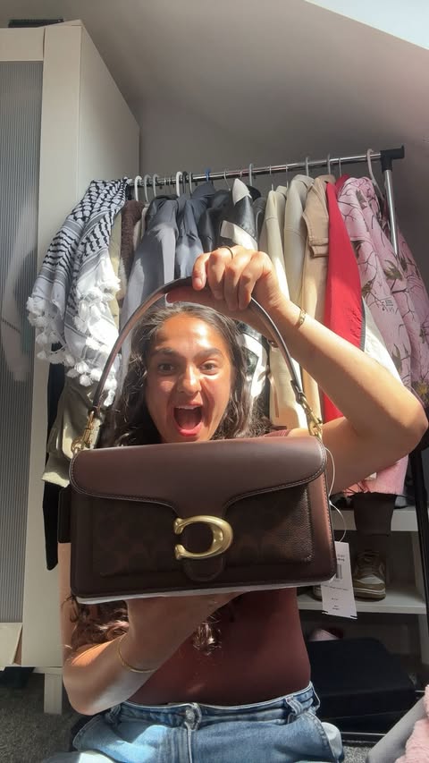 Instagram post by @layla_banaras_x for Coach. Caption reads: A little Coach unboxing 🤎 Got to choose this....