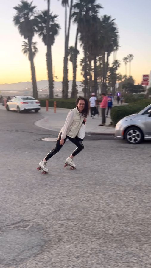 Instagram post by @kimmanningspacequeen for ororo Heated Apparel. Caption reads: Let’s go down the hill #venicebeach #veniceskater....