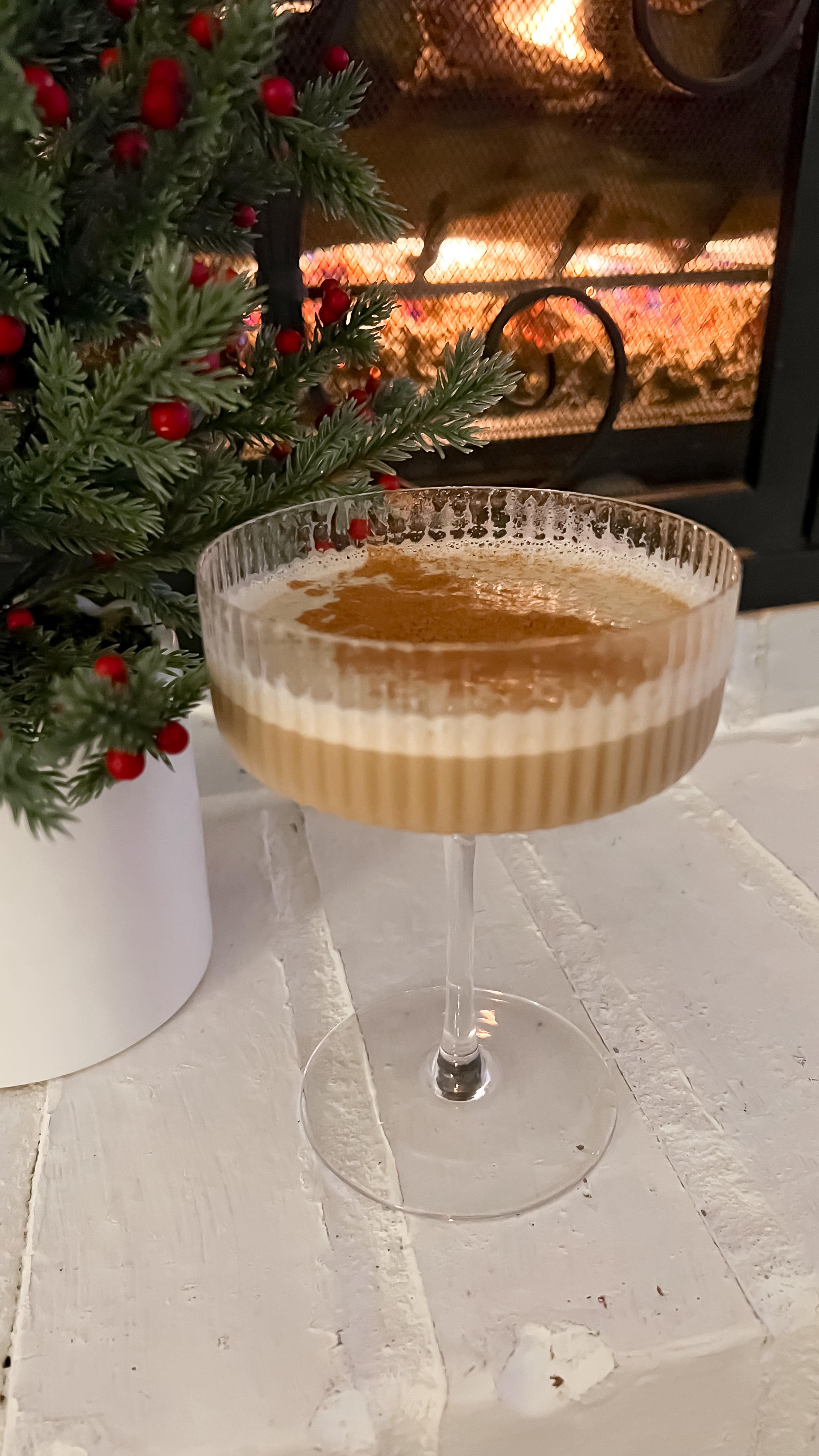 Instagram post by @hannahstemme for Tito’s Handmade Vodka. Caption reads: What I use to make a creamy espresso martini✨ Save....