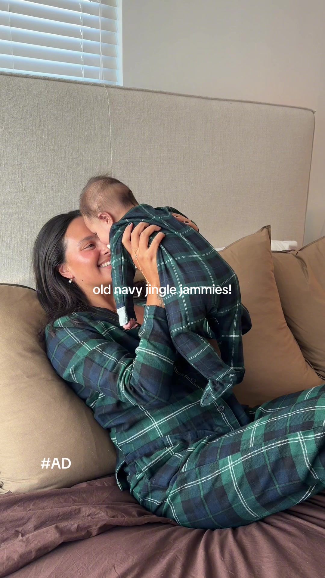 TikTok post by @laurenmaile for Old Navy. Caption reads: Our first holiday season as a family of three —....