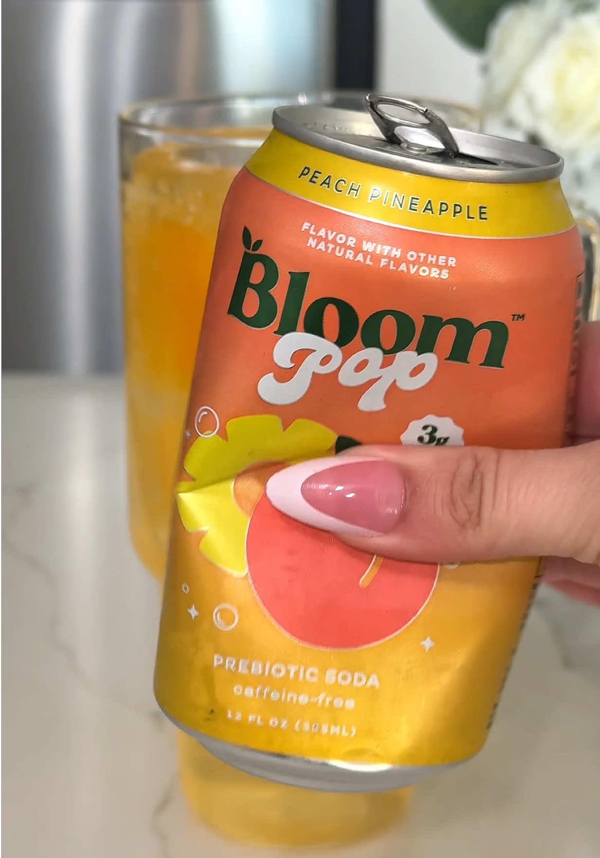 TikTok post by @lyndasedoud for Bloom Nutrition. Caption reads: [...] #neon #bloompop #giftedbybloom @Bloom....