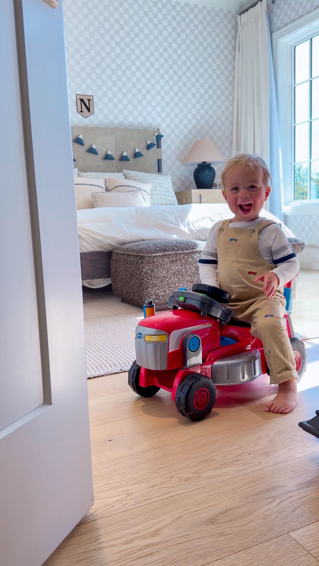 Instagram post by @emily.fauver for VTech Toys USA. Caption reads: Just out here growing and mowing with my new....