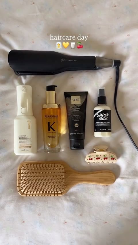 Instagram post by an influencer for Emi Jay. Caption reads: straight or curly? 🧖‍♀️💛🥛🍒 gifted - #haircare....