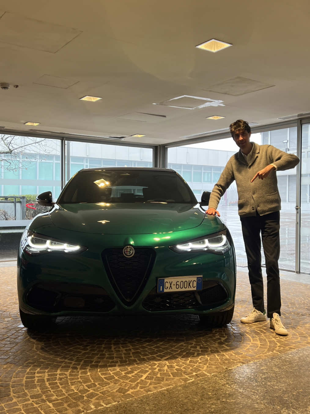 TikTok post by @ferrerof for Alfa Romeo. Caption reads: Discover with me the Alfa Romeo Stelvio Intensa....