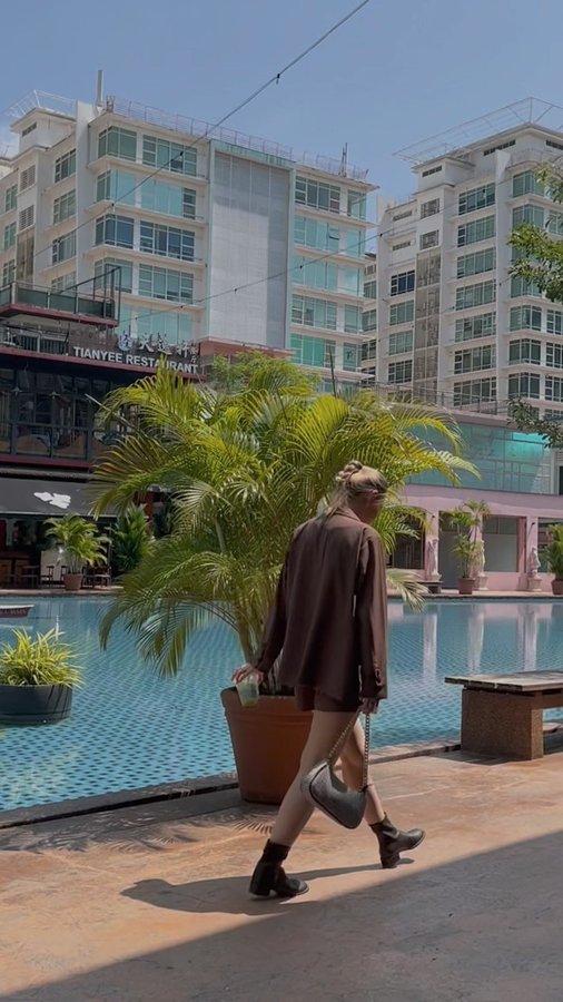 Instagram post by @natashaaaalexis for The Tinsel Rack. Caption reads: Out & about, decked in @thetinselrack 🔗

Camden....