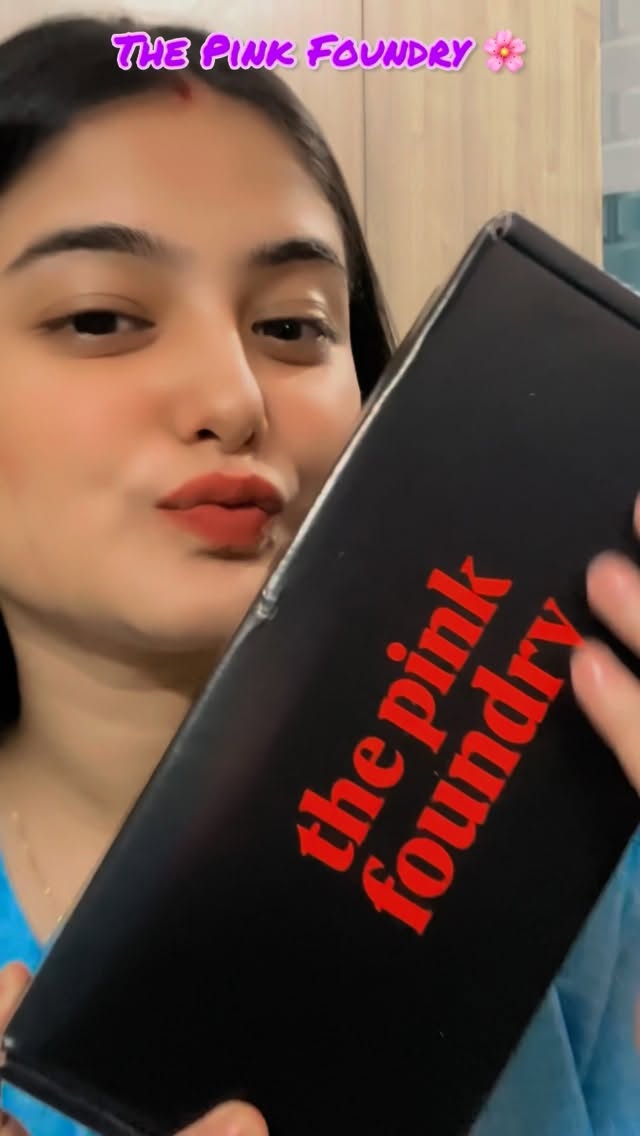 Instagram post by @_smrutirekhaa__ for The Pink Foundry. Caption reads: Glowing skin, no matter the weather!
⛈️🎀
•
#skin....