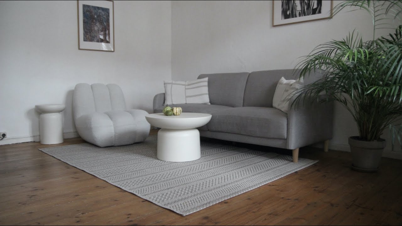 YouTube post by @MinimalMimi for ARMEDANGELS. Caption reads: MINIMALISM ROOM TOUR: 52 sqm in Berlin Prenzlauer....