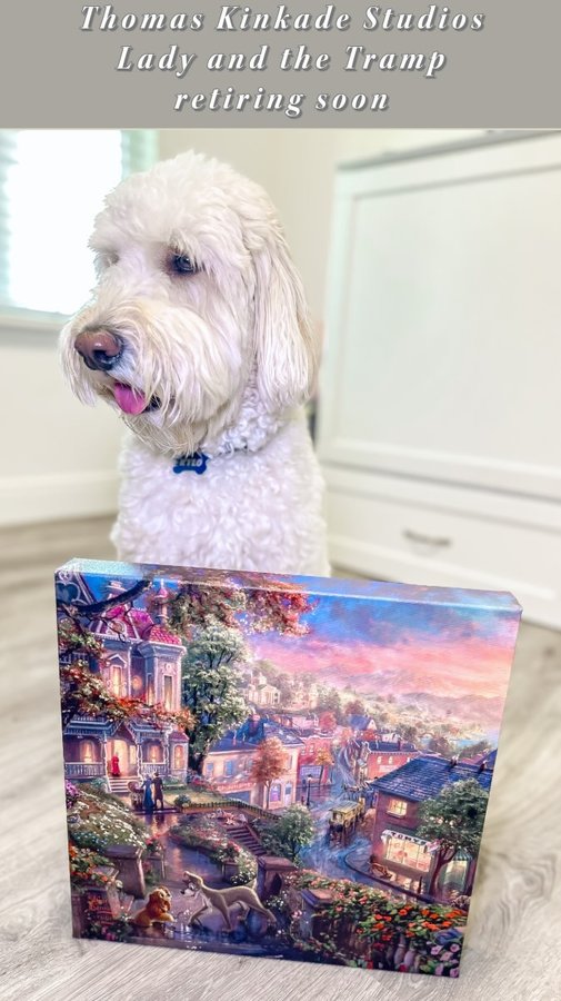 Instagram post by @mrs.everydaymommy for Thomas Kinkade Studios. Caption reads: [...] Lady and the Tramp artwork from Thomas....