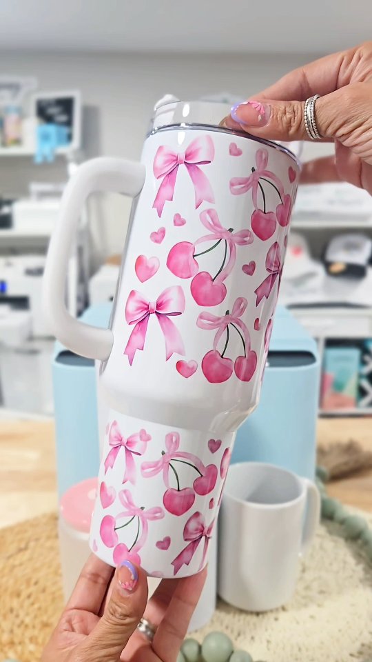 Instagram post by @jessdesigningforyou for HTVRONT. Caption reads: ✨ 40oz tumbler? No problem ✨

The new HTVRONT Auto....