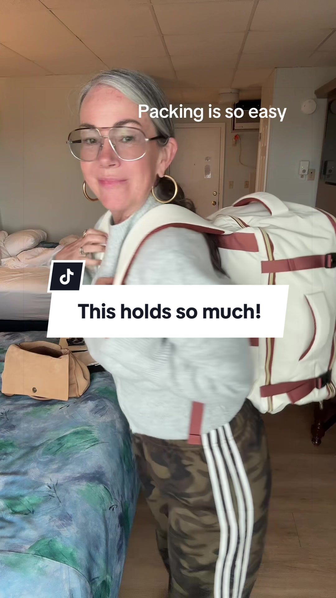 TikTok post by @aestheticaleestyles for Lovevook. Caption reads: @LOVEVOOK my favorite travel backpack holds so....