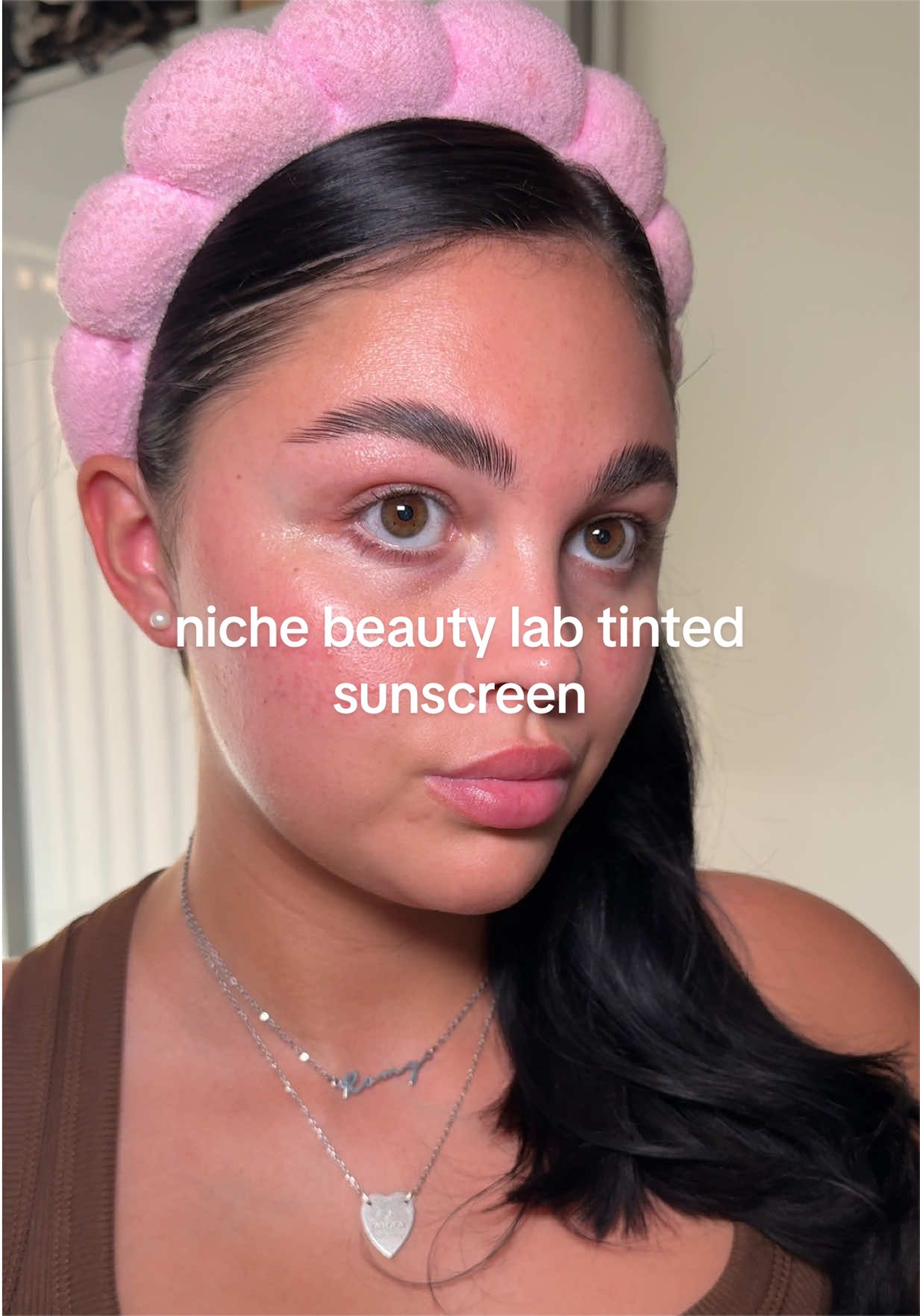 TikTok post by @romybennett for Niche Beauty Lab. Caption reads: gifted by Niche Beauty Lab the best tinted....