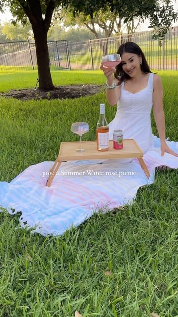 Instagram post by @suzetterey_ for Summer Water. Caption reads: @summerwater rosé is my new go-to summer beverage.....