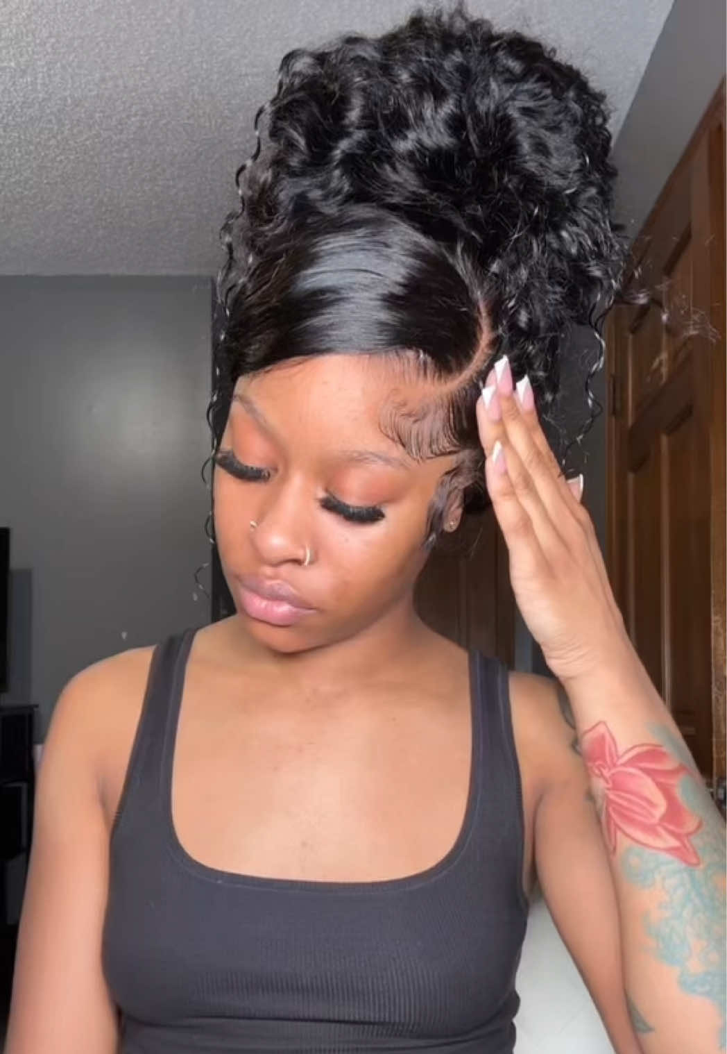 TikTok post by @juhhdior_ for Wiggins Hair. Caption reads: Now this is a real throw n go!😍😍@Wiggins Hair....