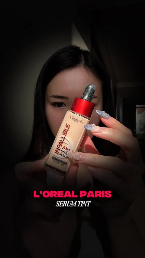 Instagram post by @claudiasunshinee for L'Oréal Indonesia. Caption reads: 1 layer = skin goals ON ✨ Siapa bilang base harus....