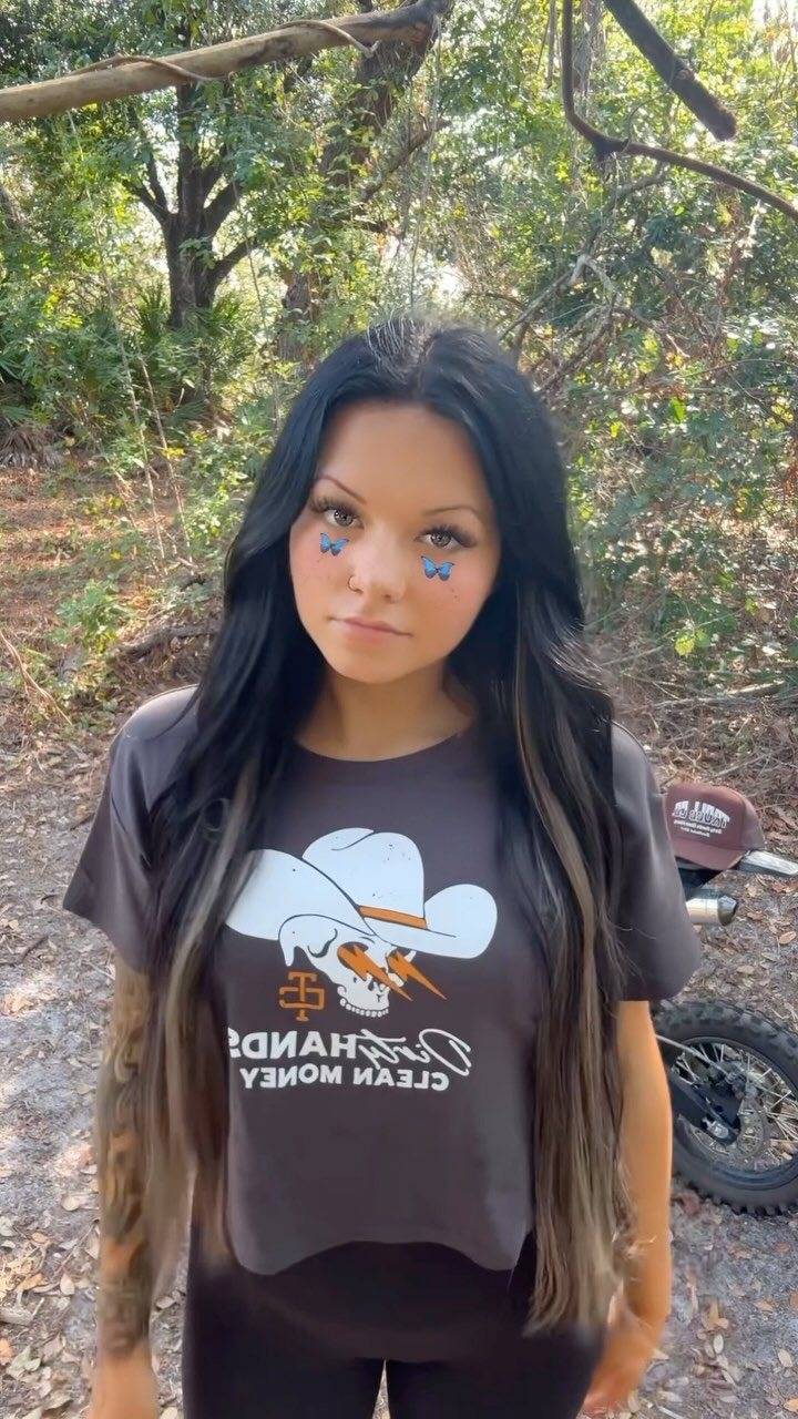 Instagram post by @peterson.jazzy for Troll Co. Clothing. Caption reads: [...] new crop tee and trucker hat from....
