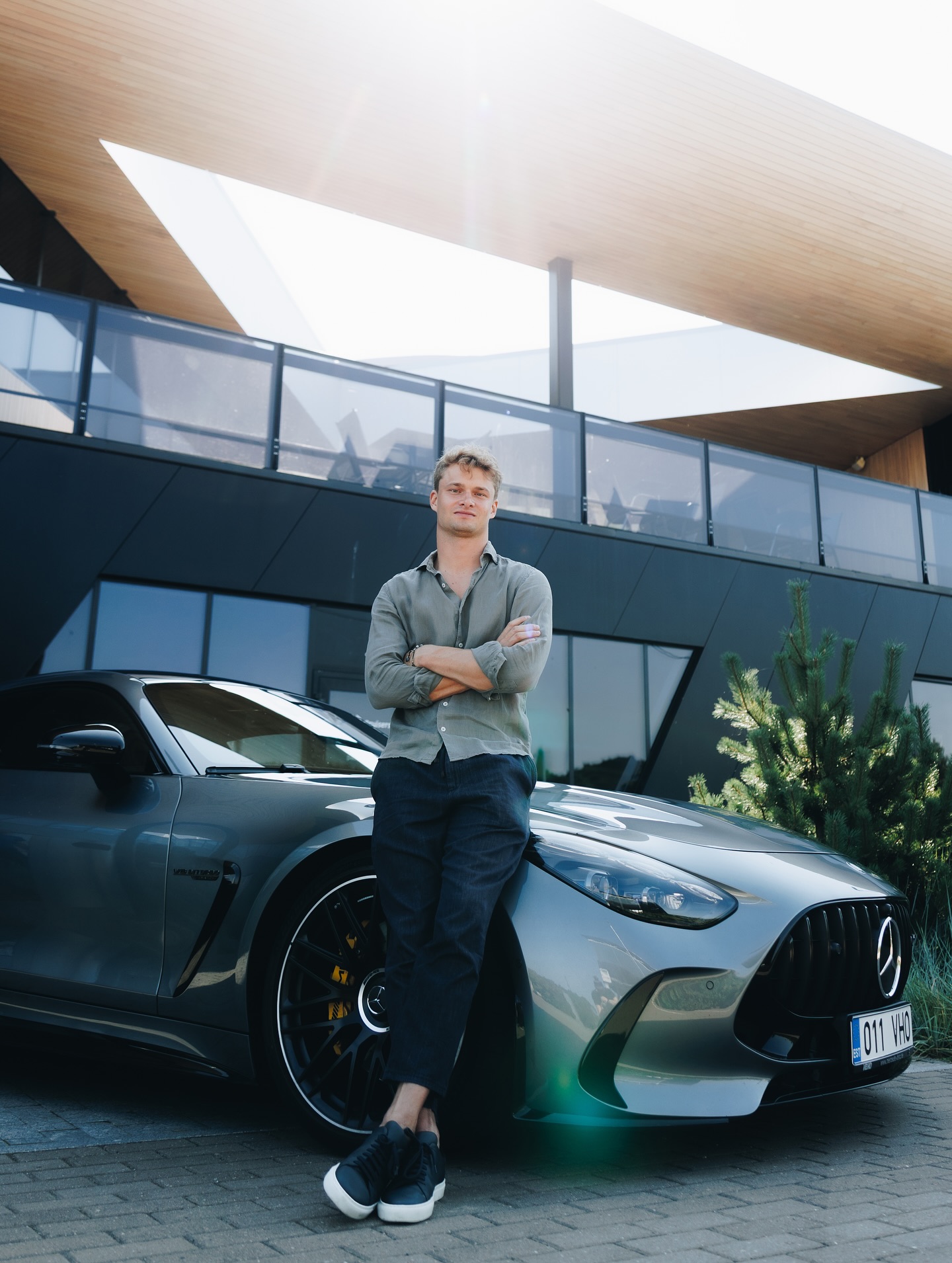 Instagram post by @aronralf for Mercedes-amg. Caption reads: Full-time racing driver, part-time model. 😉

📸....