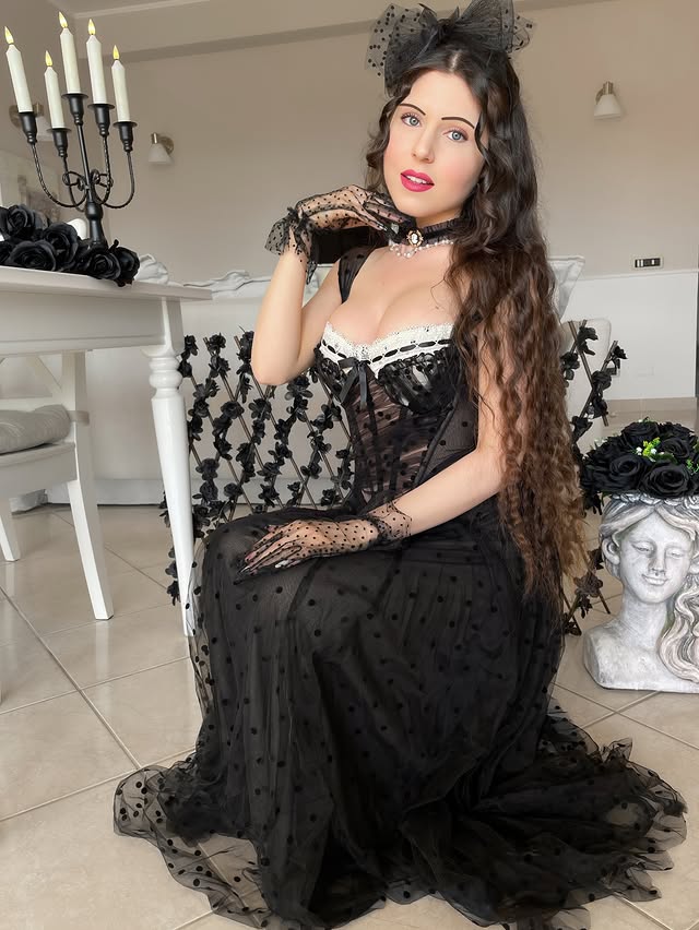 Instagram post by @arual.bloom for Lacemade. Caption reads: [...] do you think it suits me?🖤 Dress by....