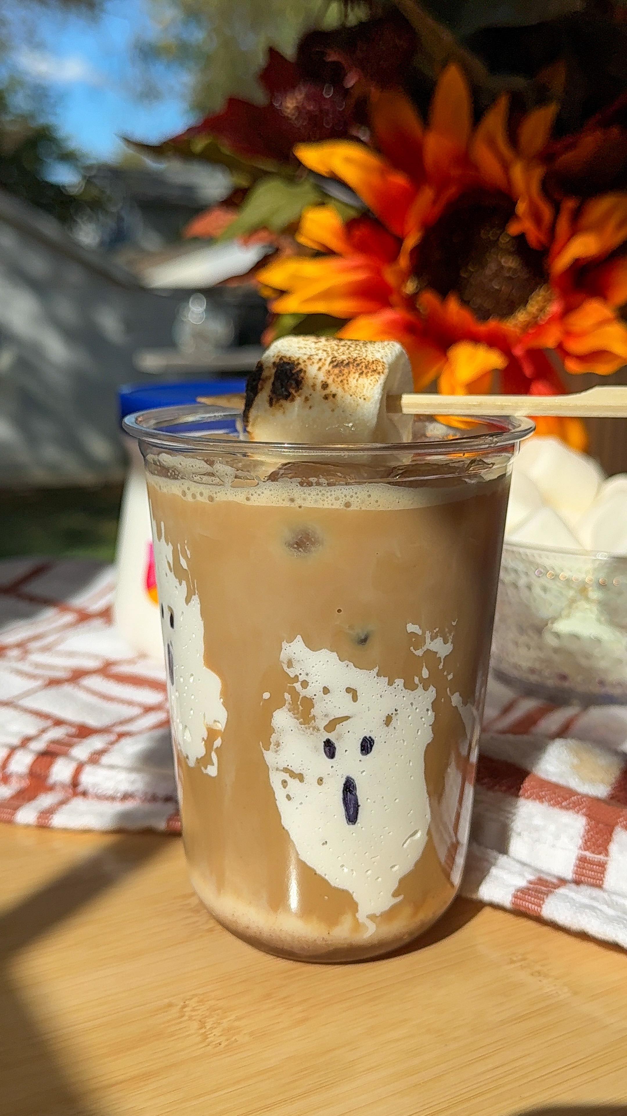 Instagram post by @munchiesbymallory for Lavazza USA. Caption reads: toasted marshmallow latte ☕️👻

let’s make the....