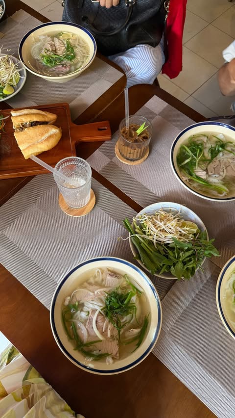 Instagram post by @arimsada for AirAsia. Caption reads: [...] in Vietnam: PHO PHO PHO 🍜🍲🇻🇳 #FlyAirAsia....
