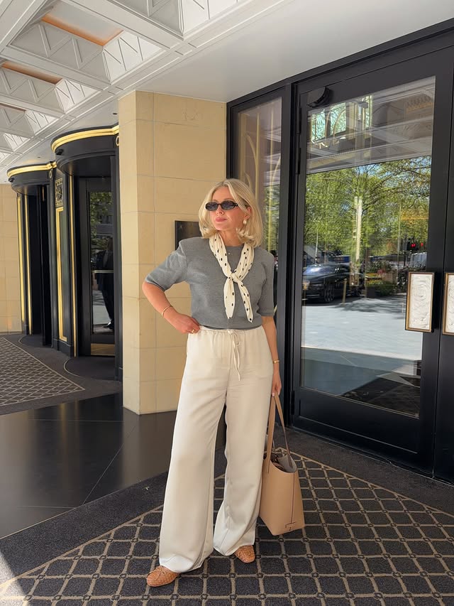 Instagram post by @laura.byrnes for Strathberry. Caption reads: Lived in a fairytale for 24 hours 🥹🤍✨ Staying at....