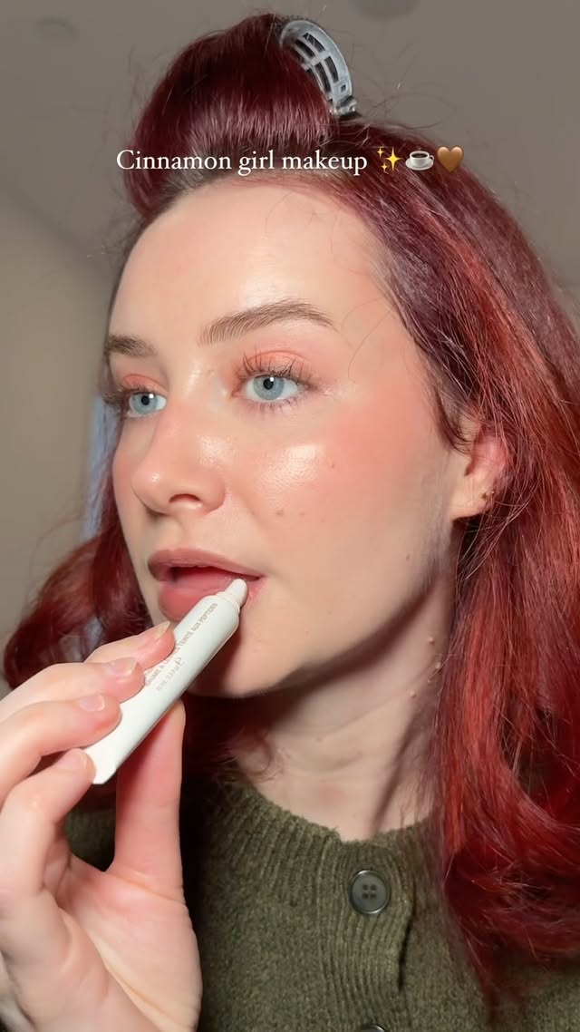 Instagram post by @youglowgrrl for RMS BEAUTY. Caption reads: Cinnamon girl makeup ✨☕️🤎

Products....