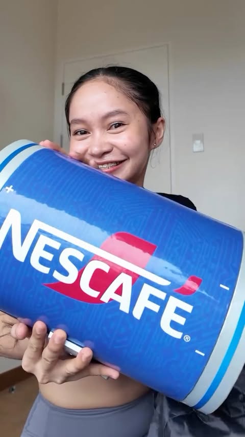 Instagram post by @algelou_j for NESCAFÉ Philippines. Caption reads: Anong lowbatt-lowbatt at hindi mag-ggym?....
