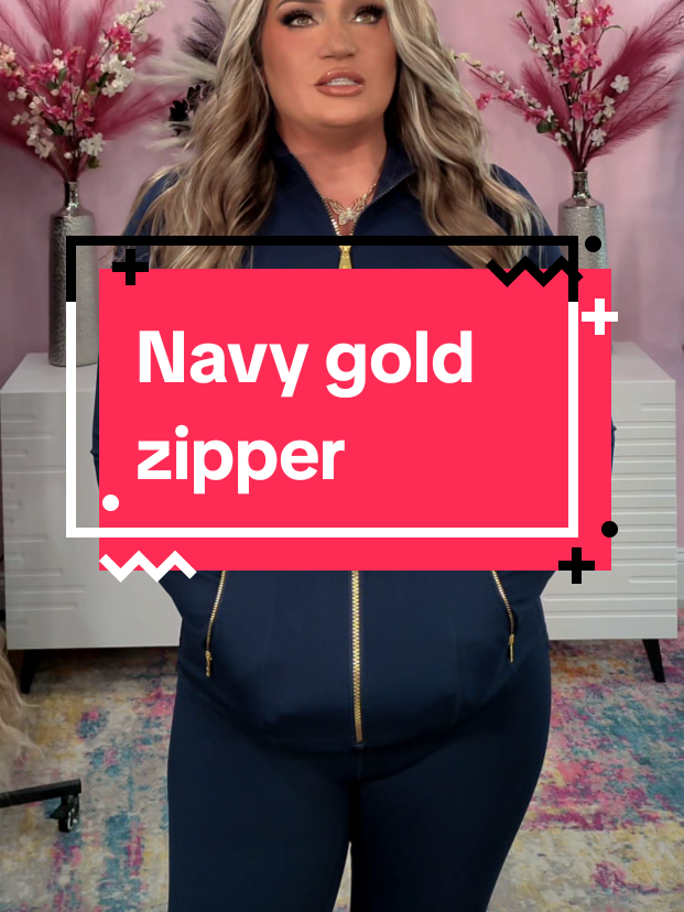 TikTok post by @sophiareneboutique for Uncia Active. Caption reads: @Uncia-Active navy blue gold zipper jacket or....