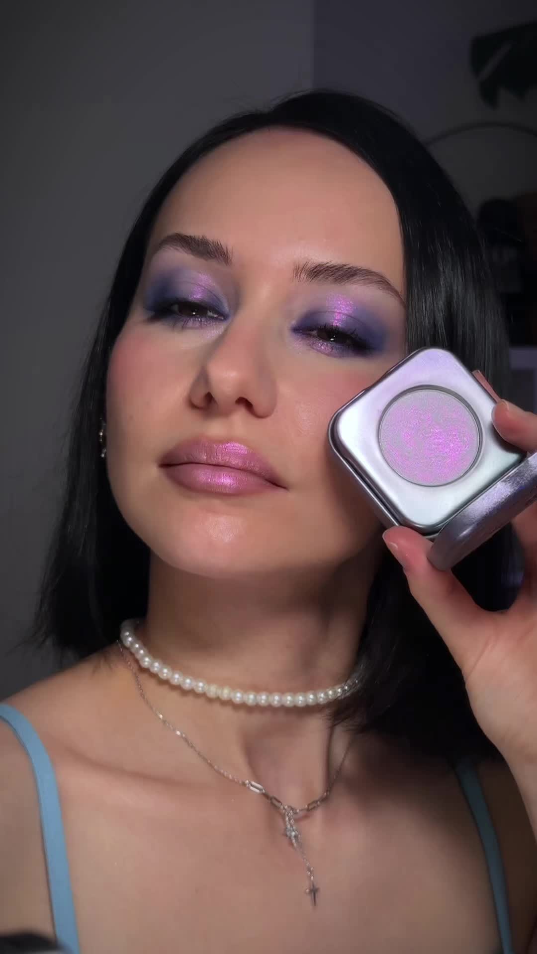 TikTok post by @izzy_deva for Kaleidos Makeup. Caption reads: [...] highlighter wins every time 🌌🌸 @Kaleidos....