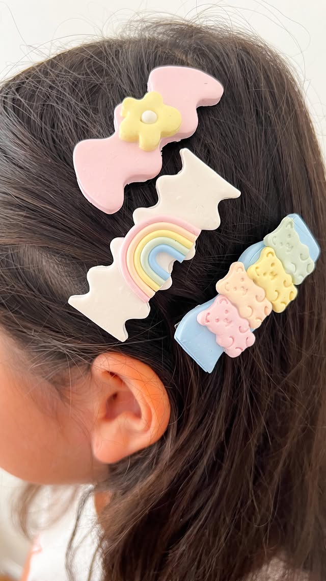 Instagram post by @mollyferreiro for Sculpey. Caption reads: PASTEL HAIR BARRETTES WITH @sculpey_official color....