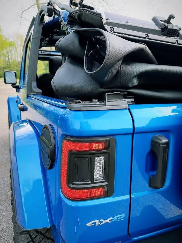 Instagram post by @joy.of.jeeping for ORACLE Lighting. Caption reads: A year later and I’m still in love with these....