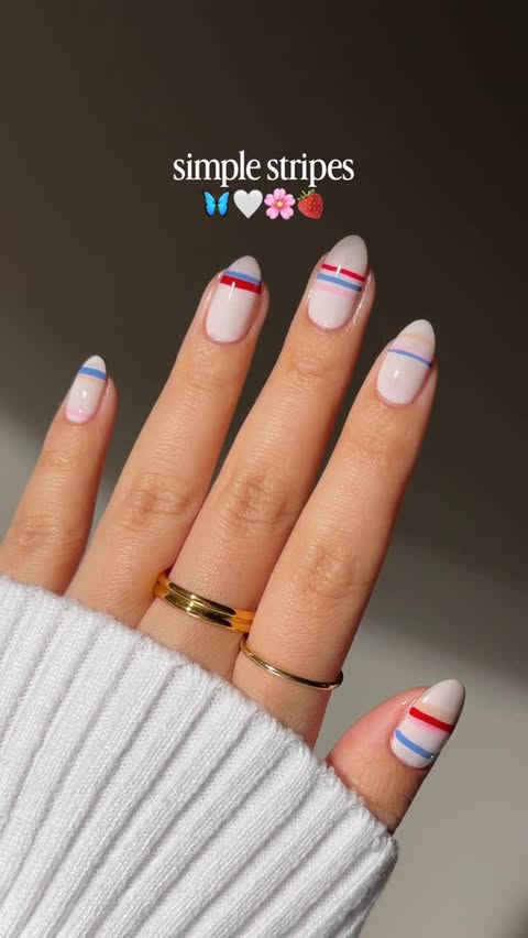 Instagram post by @bycheznails for ella+mila. Caption reads: [...] nail art trend: striped nails using....