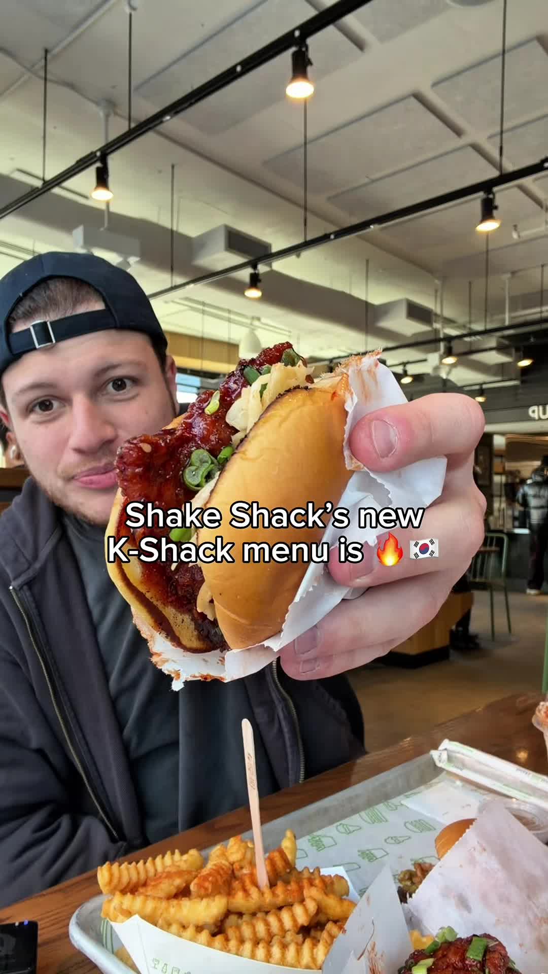 TikTok post by @maxnotbeer for Shake Shack. Caption reads: [...] if you thought i wouldn’t RUN to try Shake....