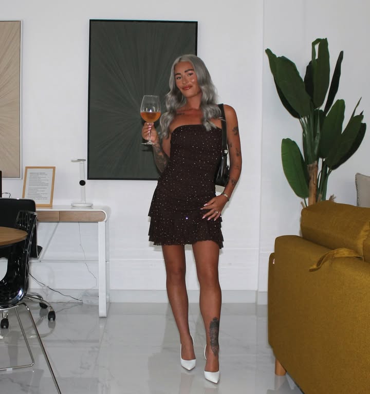 Instagram post by @jodiefeeneyobrien for Pink Vanilla. Caption reads: [...] christmas everyone 🍸✨🎅🎄 

dress....