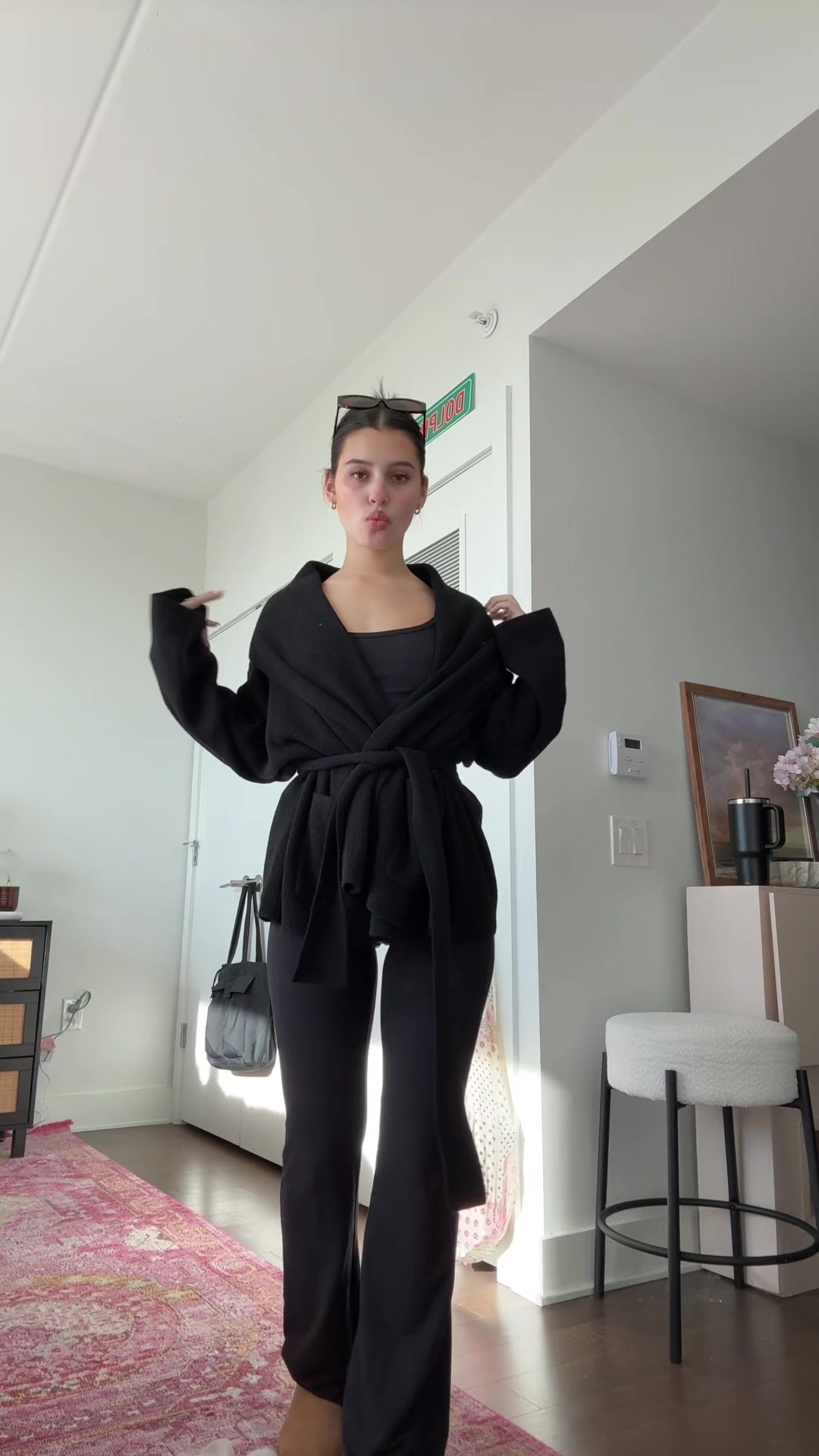 TikTok post by @ssophiaquintero for House of CB. Caption reads: outfit linked in my ltk, sweater from @houseofcb .