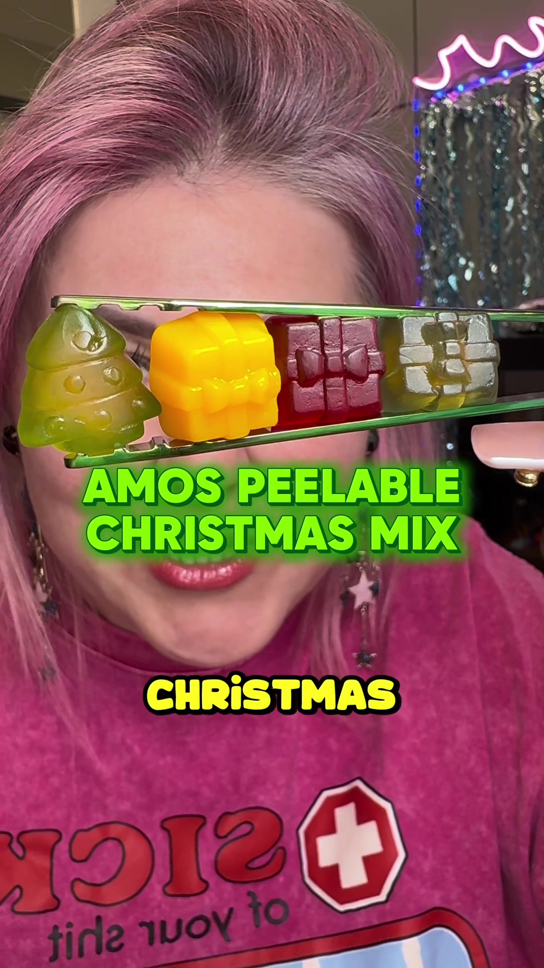 TikTok post by @maria_foundit for Amos Sweets. Caption reads: [...] Christmas presents with @Amos Sweets ....