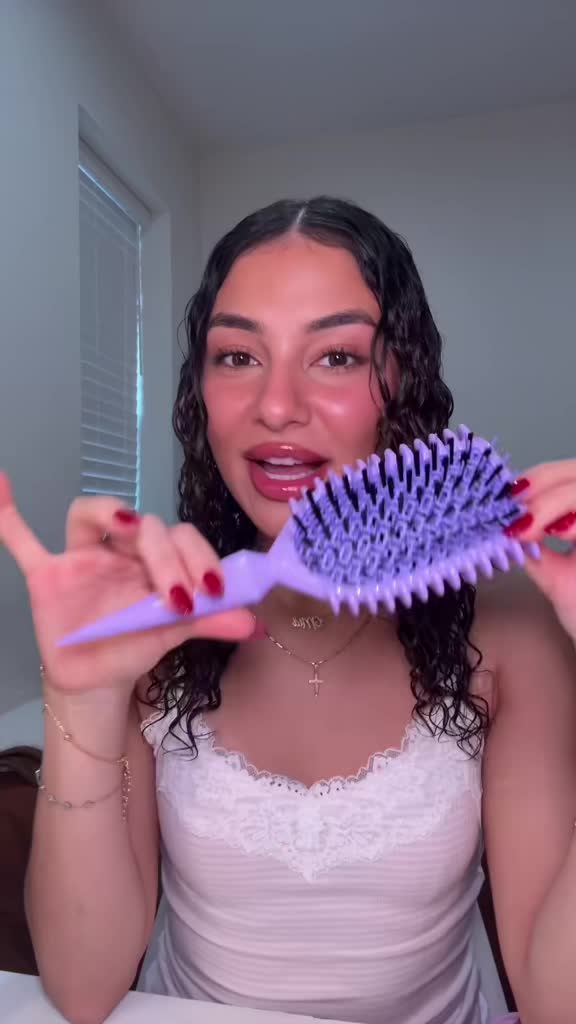TikTok post by @itsnotnotus for Conair. Caption reads: brush style my hair with me using the conair curl....