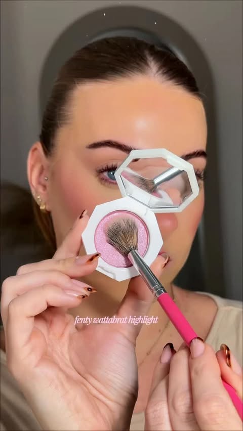 Instagram post by @katiewakenshaw for FENTY BEAUTY BY RIHANNA. Caption reads: A highlighter for the girls ✨ using the new....