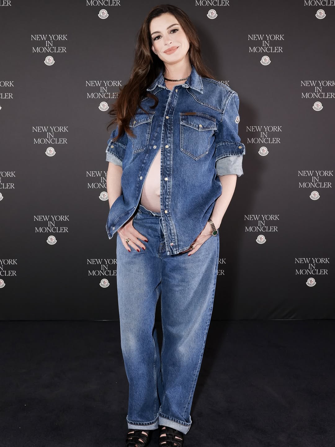 Instagram post by @annehathaway for Moncler. Caption reads: Congratulations to @moncler on the new store....
