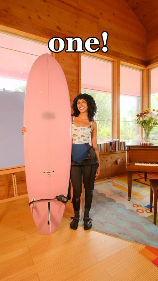 Instagram post by @jennelle.eliana for T-Mobile. Caption reads: come surfing with me 🏄🏾‍♀️🌊🦭 @tmobile....