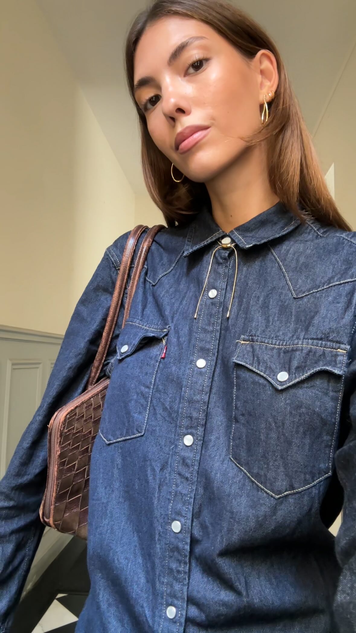 Instagram post by @leyakain for PDPAOLA. Caption reads: Back to my routine @pdpaola_jewelry (ad).