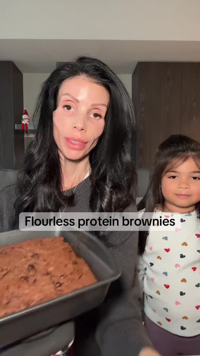 Instagram post by @healthyish_mommy for Orgain. Caption reads: Flourless brownies with 20 grams of protein?! Yes....