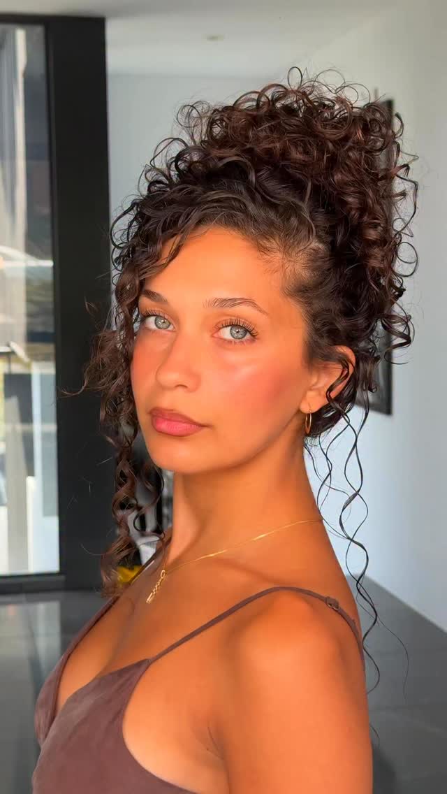 Instagram post by @jaymejo for UMBERTO GIANNINI. Caption reads: Curly hair has never been just hair. 
It’s been....