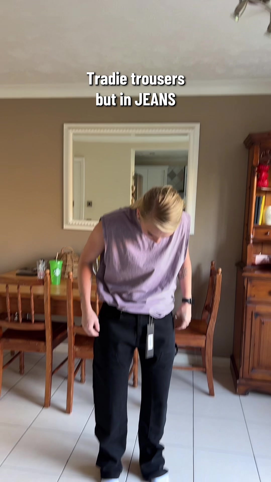 TikTok post by @gracekelly_mcguire for Legend London. Caption reads: TRADIE TROUSERS IN JEANS @Legend London .